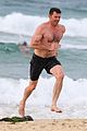 hugh jackman goes shirtless at the beach with his hot trainer 43