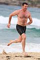 hugh jackman goes shirtless at the beach with his hot trainer 48
