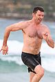 hugh jackman goes shirtless at the beach with his hot trainer 51
