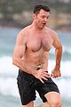 hugh jackman goes shirtless at the beach with his hot trainer 53