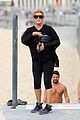 hugh jackman goes shirtless at the beach with his hot trainer 58