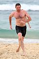 hugh jackman goes shirtless at the beach with his hot trainer 59