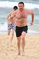 hugh jackman goes shirtless at the beach with his hot trainer 60
