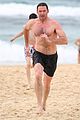 hugh jackman goes shirtless at the beach with his hot trainer 61