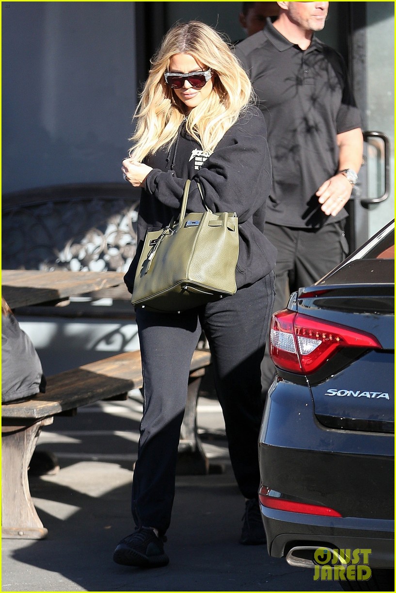 Pregnant Khloe Kardashian Covers Up Baby Bump While Filming 'KUWTK