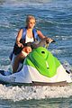 sofia richie rides a jet ski in a white bikini on miami beach 07