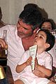 simon cowell charity event barbados dogs 04
