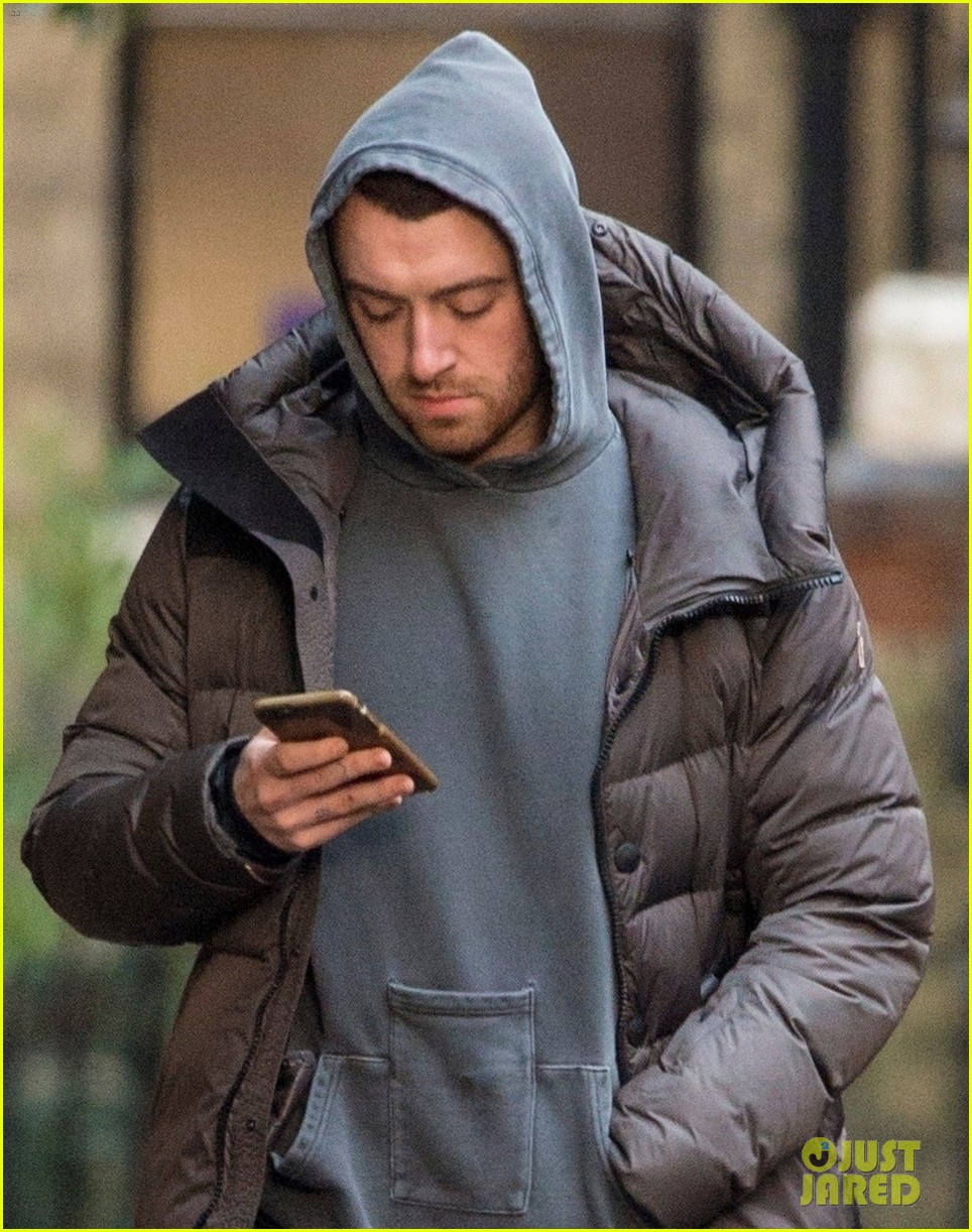 sam smith bundles up for a stroll in london 044003704