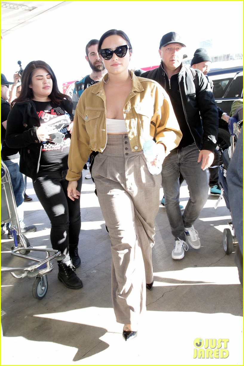 demi lovato rocks tiny top while catching flight out of lax 01