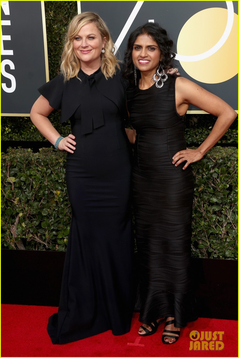 Amy Poehler Walks Golden Globes 2018 Red Carpet with Activist Saru