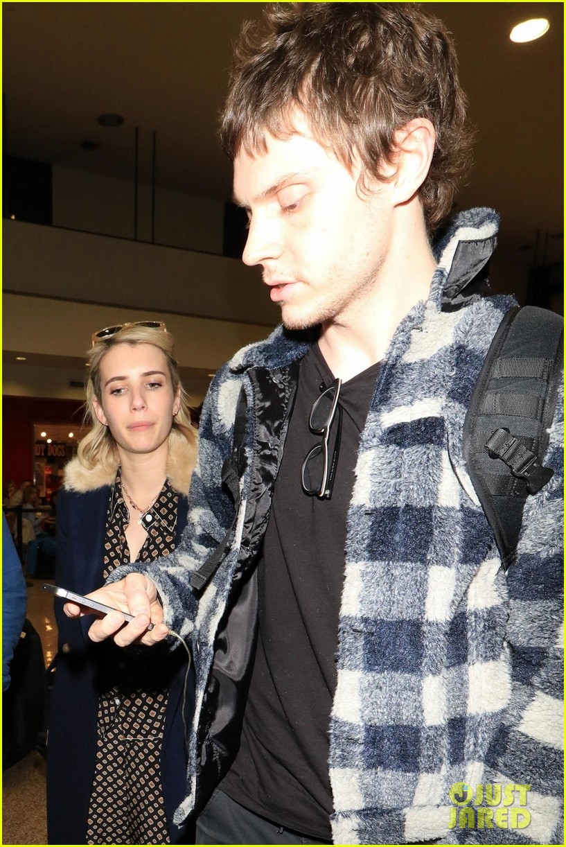emma roberts and evan peters touch down in salt lake city ahead of sundance 094016762
