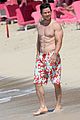 mark wahlberg flaunts chiseled abs on new years day stroll in barbados 02