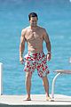 mark wahlberg flaunts chiseled abs on new years day stroll in barbados 05