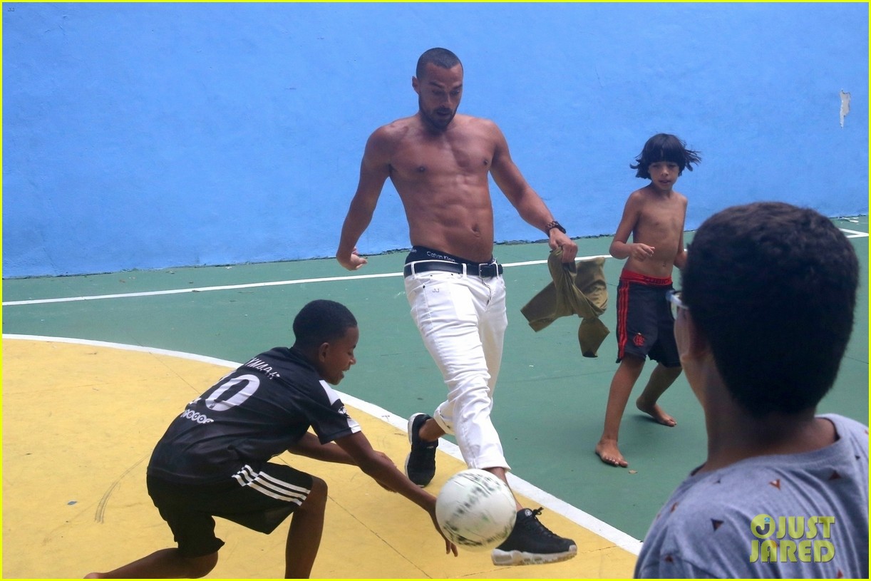 jesse williams goes shirtless bares ripped abs 024007637