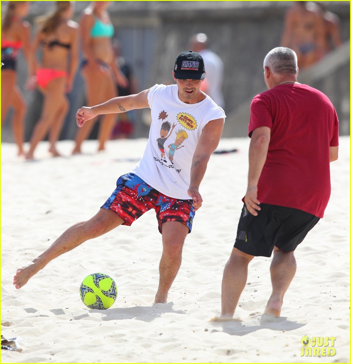 joe jonas plays soccer on the beach in sydney 114037949