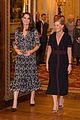 pregnant kate middleton attends fashion event at buckingham palace 07