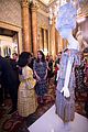 pregnant kate middleton attends fashion event at buckingham palace 21