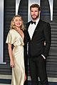 miley cyrus and liam hemsworth share super sweet moment at vanity fairs oscars party 04