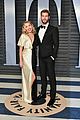 miley cyrus and liam hemsworth share super sweet moment at vanity fairs oscars party 07
