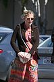 pregnant kirsten dunst kicks off her weekend at the grocery store 13