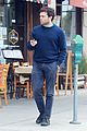 alden ehrenreich chats on his phone while out in beverly hills 03