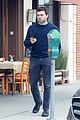 alden ehrenreich chats on his phone while out in beverly hills 05
