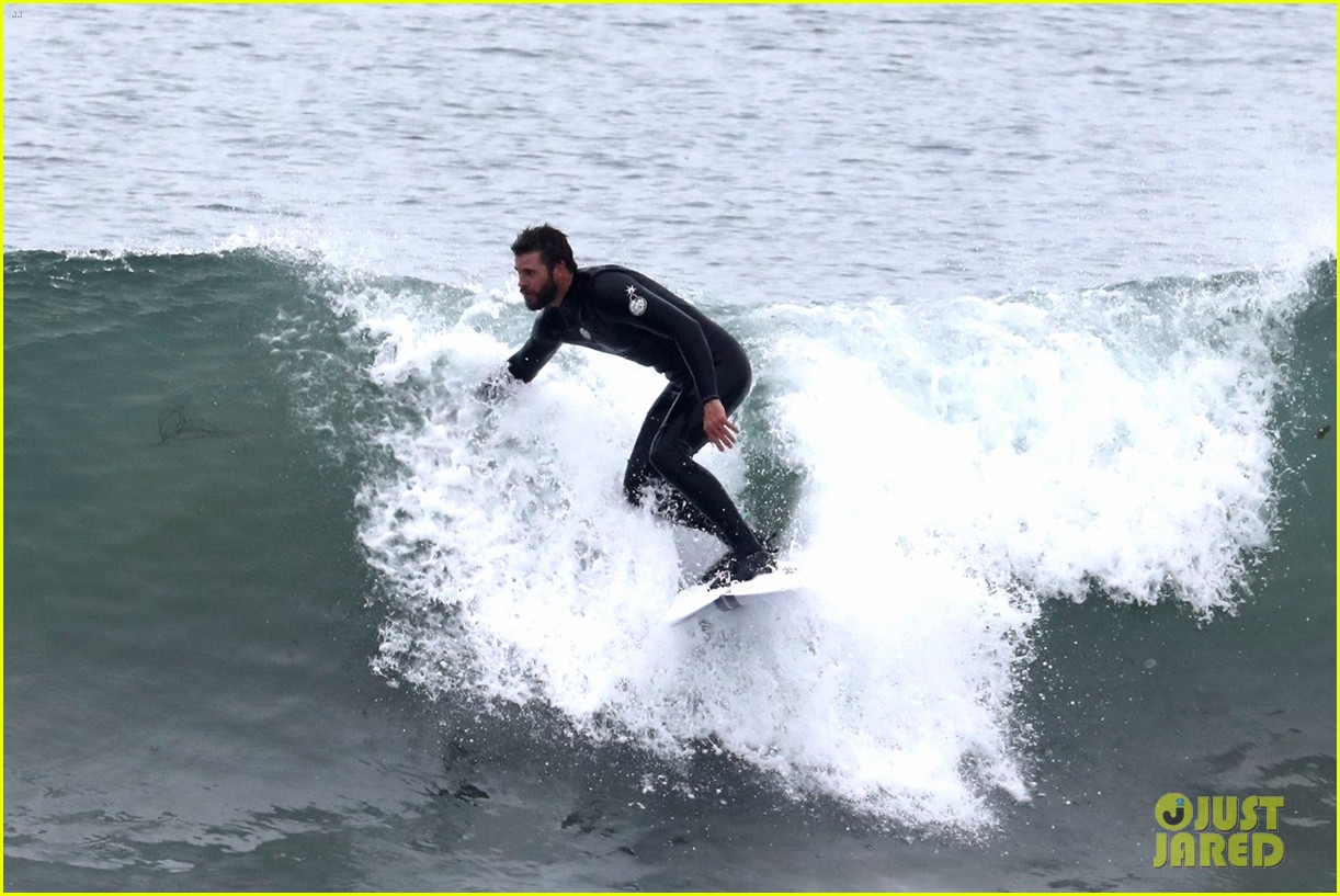 liam hemsworth puts surfing skills on display in malibu 264054487