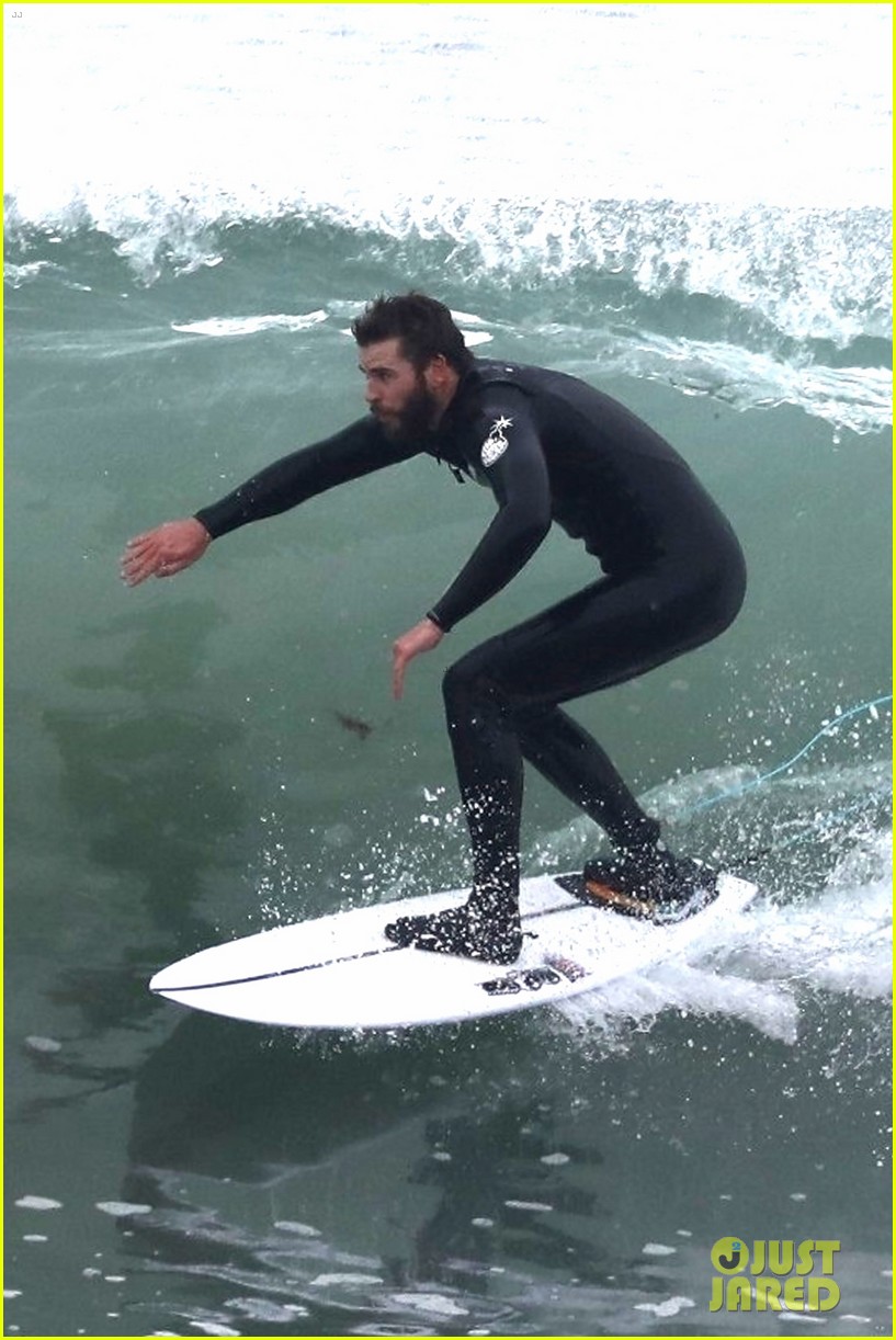 liam hemsworth puts surfing skills on display in malibu 29