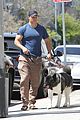 henry cavill shows off buff biceps taking his dog for a walk 01