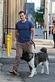 henry cavill shows off buff biceps taking his dog for a walk 03