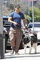henry cavill shows off buff biceps taking his dog for a walk 08
