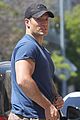 henry cavill shows off buff biceps taking his dog for a walk 10
