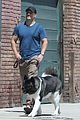 henry cavill shows off buff biceps taking his dog for a walk 11