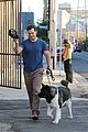 henry cavill shows off buff biceps taking his dog for a walk 12