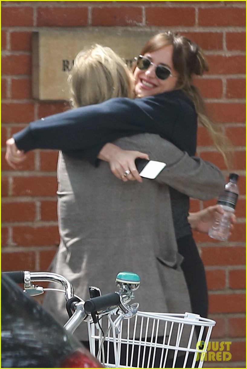 dakota johnson couldnt be more excited to see her friend 084060554
