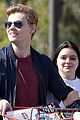 ariel winter and levi meaden rock matching shoes while shopping at costco 01