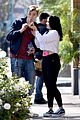ariel winter and levi meaden rock matching shoes while shopping at costco 06