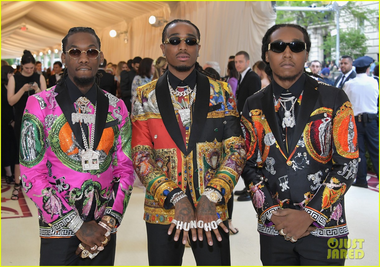 migos match in colorful versace suits and major bling at met gala 2018 014078818