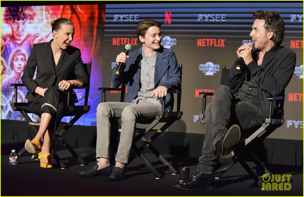 millie bobby brown naoh schnapp hold hands at stranger things panel 064087115
