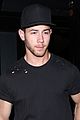 nick jonas shows off bicep muscles friday night 04