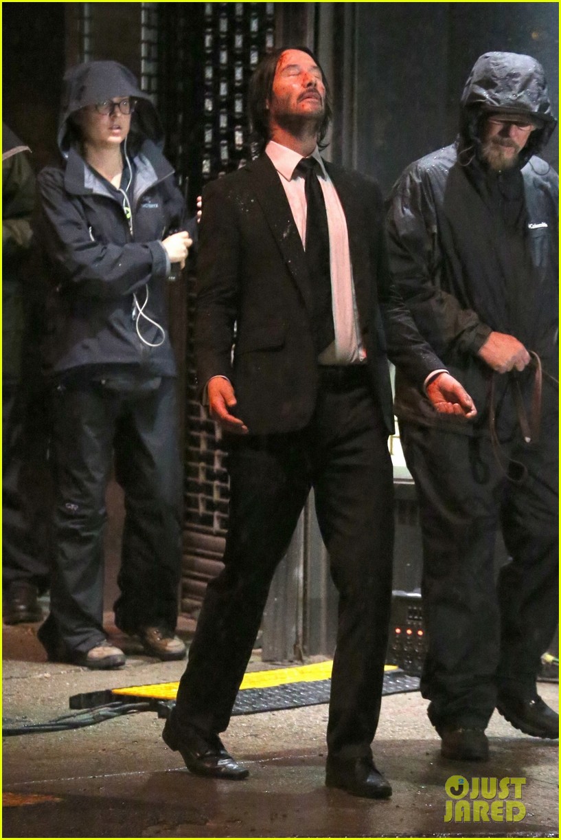 keanu reeves gets caught in the rain again for john wick 154090286