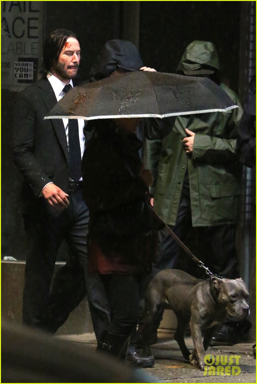 keanu reeves gets caught in the rain again for john wick 404090311
