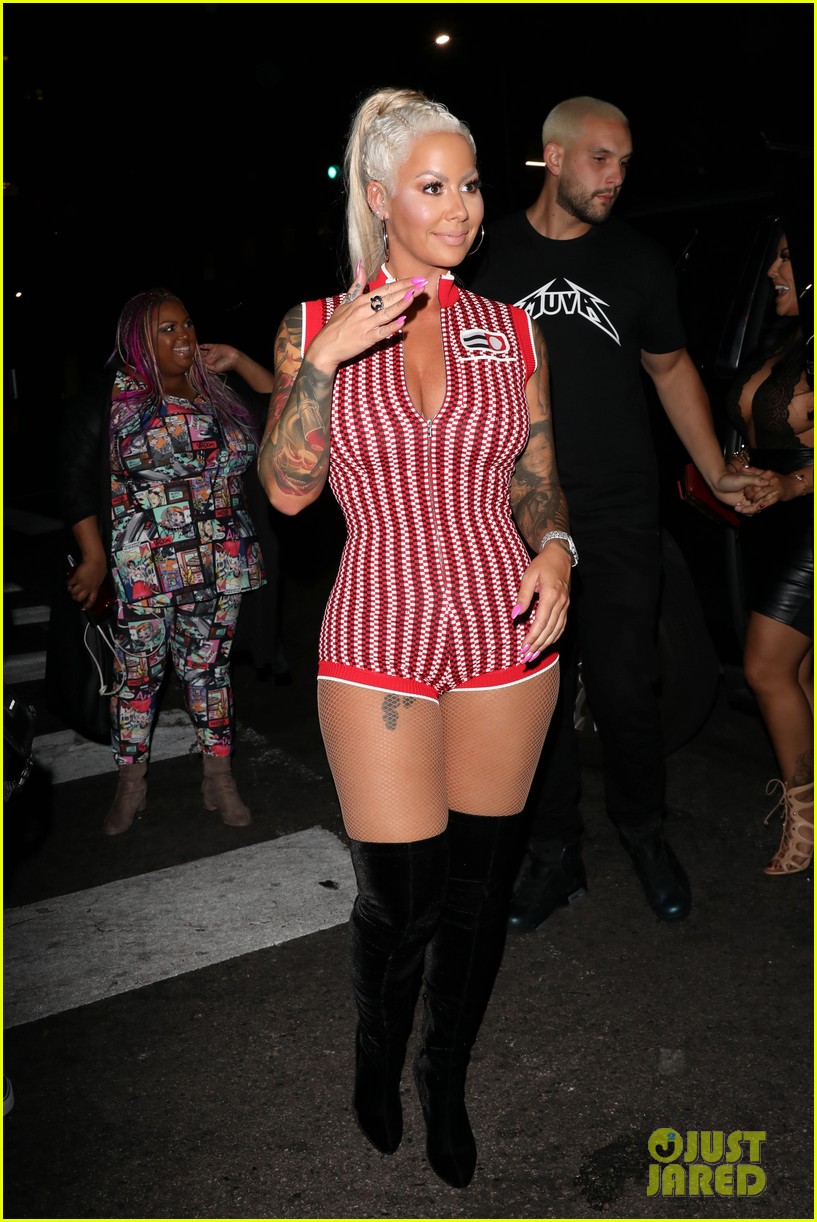 amber rose shows off her long blonde hair and curves at the club 054075075
