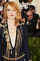 emma stone stuns in plunging navy and gold gown at met gala 2018 02