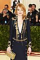 emma stone stuns in plunging navy and gold gown at met gala 2018 05