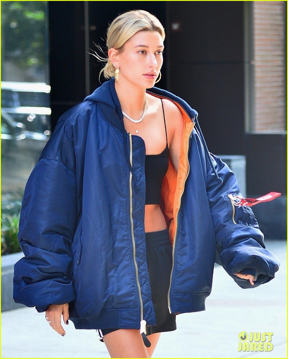 hailey baldwin pairs crop top with gym shorts while out in nyc 02
