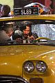 keanu reeves stops a cab in rain john wick 3 01