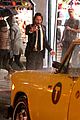keanu reeves stops a cab in rain john wick 3 09