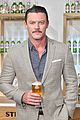 luke evans looks dapper while unveiling stellaspace with stella artois in nyc 07