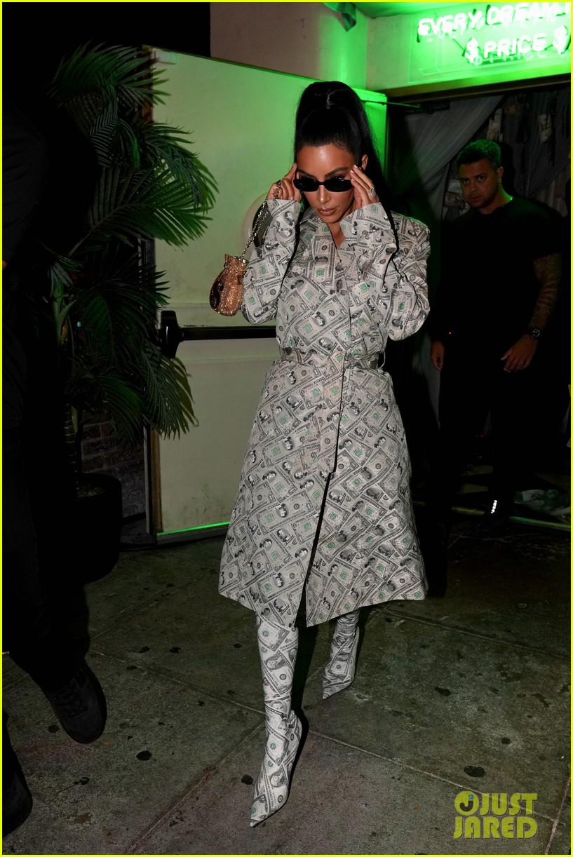 kim kardashian wears dollar bill covered coat and boots while out with kylie jenner23.4155463